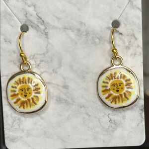 Sun Motif Gold and White Earrings